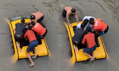 পানিতে তলিয়ে গেল গাড়ি, কাঁচ ভেঙে চালককে উদ্ধার