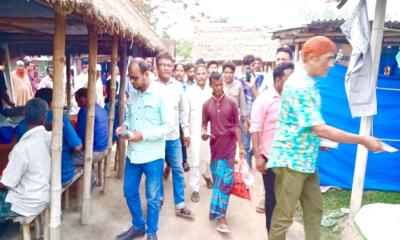 পার্বতীপুরে তারেক রহমানের ৩১ দফা লিফলেট বিতরণ ও পথসভা