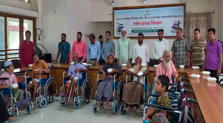 নকলায় দরিদ্র ও অসচ্ছল প্রতিবন্ধীদের হুইল চেয়ার বিতরণ