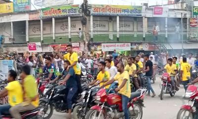 পত্নীতলায় ব্রাজিল সমর্থকদের বর্ণাঢ্য শোভাযাত্রা অনুষ্ঠিত