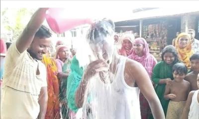 সাদুল্লাপুরে স্ত্রীকে তালাক দিয়ে মহাআনন্দে দুধ দিয়ে গোসল করলেন স্বামী