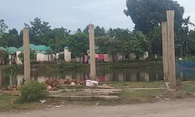 মদনে পুকুর দখল করে ভবন নির্মাণের অভিযোগ
