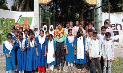 মান্দায় স্বপদে যোগদান করলেন প্রধান শিক্ষক বাদেশ আলী