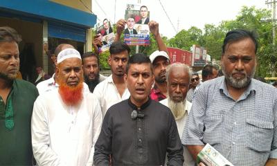 ৩১ দফার লিফলেট বিতরণ ও ধানের শীষের সমর্থনে গণসংযোগ