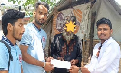 মদনে অসহায়দের মাঝে আর্থিক সহায়তা