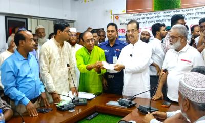 কালীগঞ্জে ত্রাণের চেক ও চাল বিতরণ এমপি’র